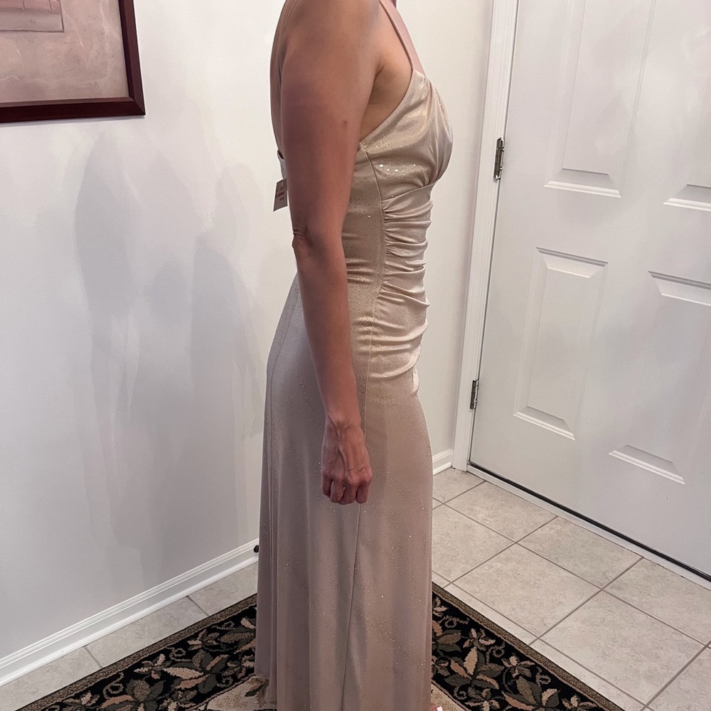 Taboo brand spaghetti strapped gown, $70.